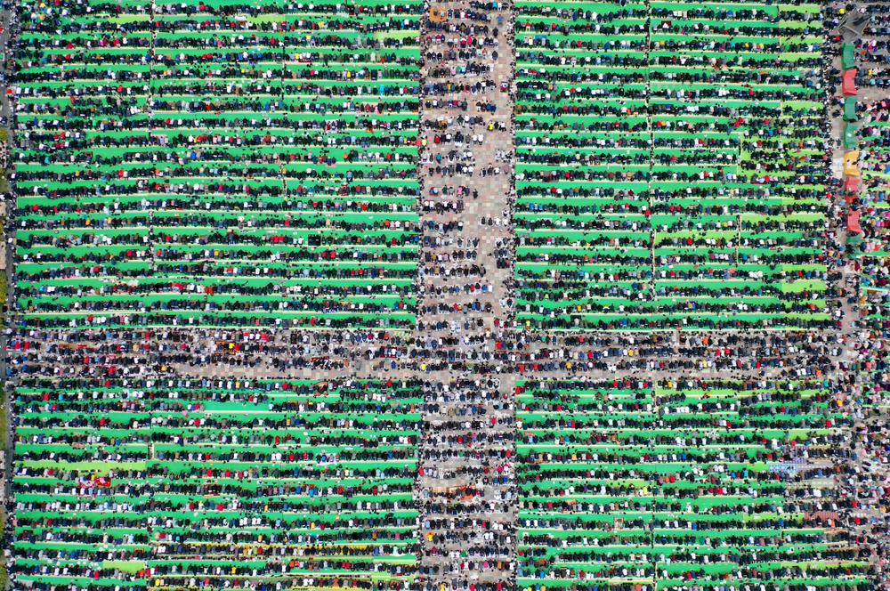 Albanian Muslims pray at Skenderbeg Square in Tirana to mark the end of Ramadan.