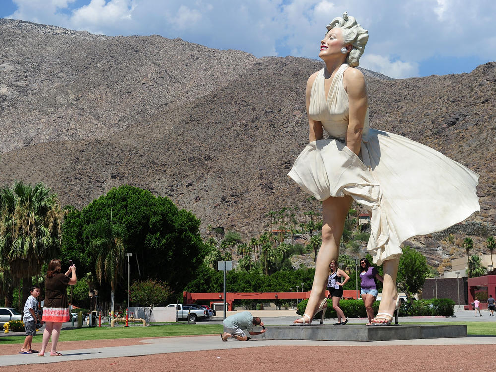 The 'Forever Marilyn' statue by artist Seward Johnson was first in Palm Springs from 2012 to 2014. Now, she's headed back to the resort town permanently. But her return is sparking a backlash.