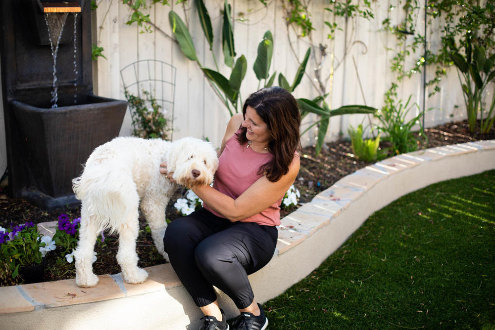 Minhas, with her 8-month-old puppy Murphy, says she felt relief after getting diagnosed with POTS, a blood circulation disorder, and her health is improving slowly with treatment.