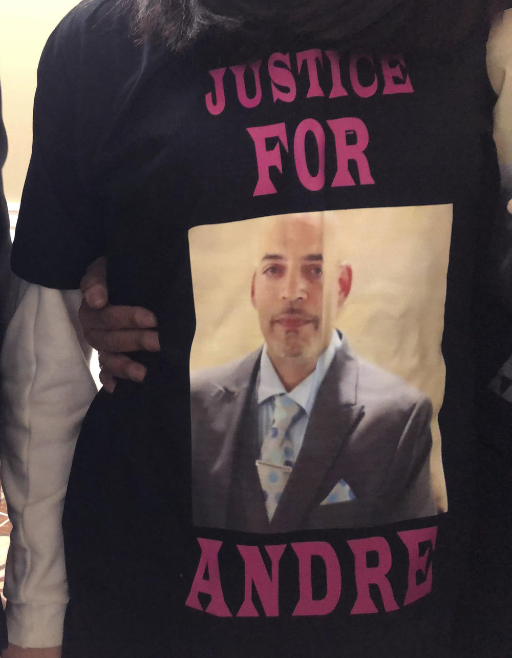 Andre Hill, fatally shot by Columbus Police on Dec. 22, is memorialized on a shirt worn by his daughter, Karissa Hill, in Columbus, Ohio, on Dec. 31.