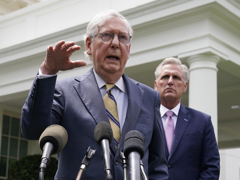 Senate Minority Leader Mitch McConnell, left, and House Minority Leader Kevin McCarthy speak to reporters outside the White House after meeting with President Biden Wednesday.