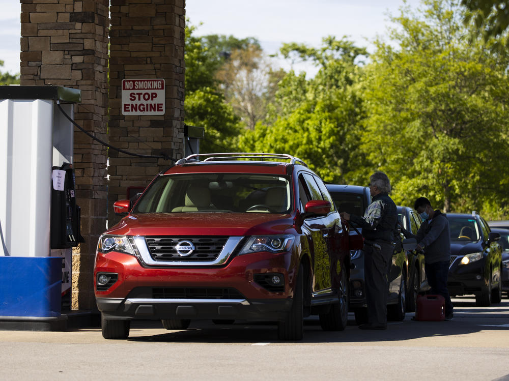 Customers wait in line to fill up their tanks this week at a Costco gas station in Nashville, Tenn. It will take several days for the supply chain of fuel to return to normal even after Colonial Pipeline said it had brought its entire pipeline system back into operation.