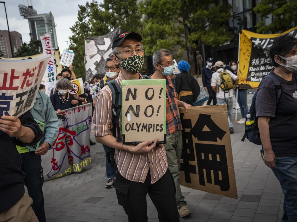 A crowd demonstrates against the Tokyo Olympics earlier this month in Tokyo. With less than three months remaining until the Olympics, concern lingers in Japan over the feasibility of hosting such a huge event during the ongoing COVID-19 pandemic.