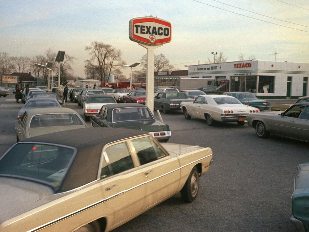 Motorists line up at a gas station on New York's Long Island, hoping to fill their tanks during the gasoline shortage of 1973-74. Long lines and fuel restrictions were common across the country.