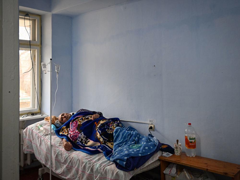 A patient rests at the COVID ward of the regional hospital in Leova, Moldova, on March 23. Moldova remains one of the poorest countries in Europe and has relied on vaccine donations from Romania and COVAX, a program that aims to distribute the world's vaccines more equitably.