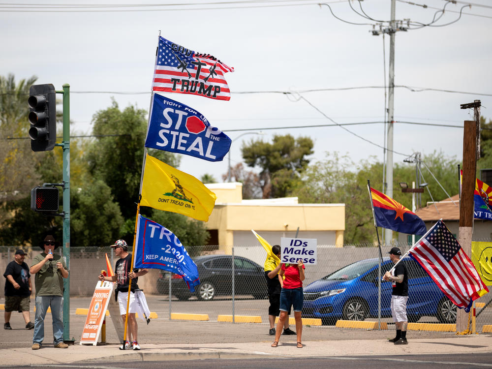 Demonstrators in support of former President Donald Trump gather on May 1 outside the Arizona Veterans Memorial Coliseum in Phoenix, where a controversial 2020 general election review was set to begin. Trump has heartily supported the audit.