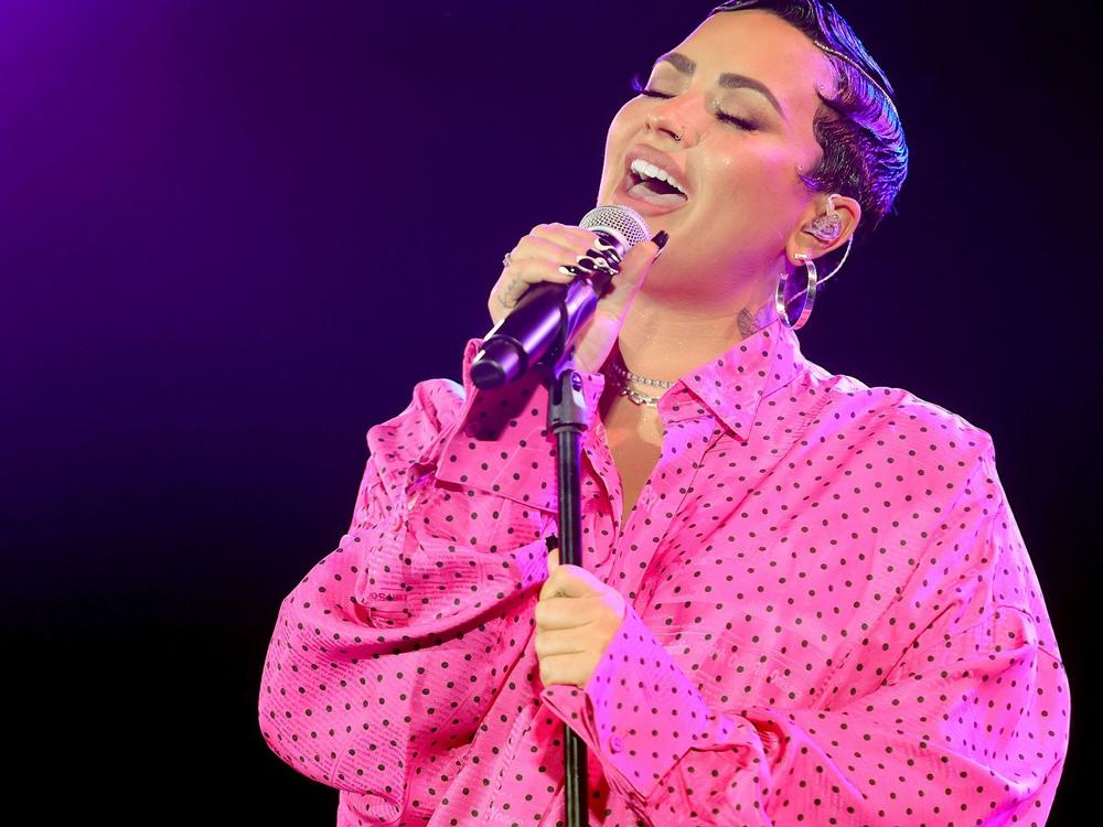 Demi Lovato performs during a premiere event for their documentary <em>Demi Lovato: Dancing With The Devil</em>.