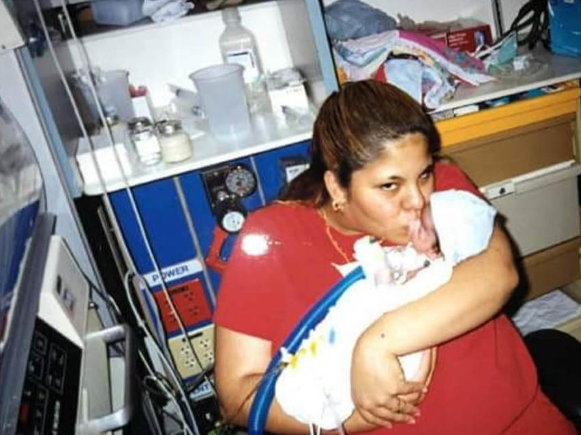 Tarah and Isaiah Acosta are seen in the hospital about a month after Isaiah's birth.