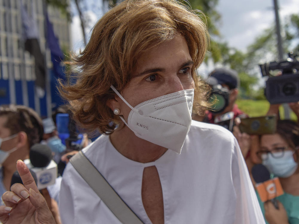 Cristiana Chamorro is seen outside Nicaragua's Ministry of the Interior after being accused of money laundering on Thursday. She has said she'll run against President Daniel Ortega in this year's presidential election.