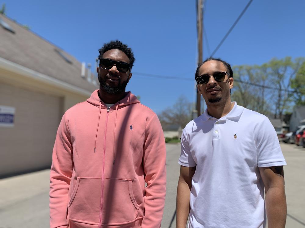 Marckus Williams (left) and Michael McFarland grew up in Indianapolis and have lived around the Arlington Woods area for years. They think the new grocery store will be a great help for many as they have seen family members and neighbors struggle to access fresh food.