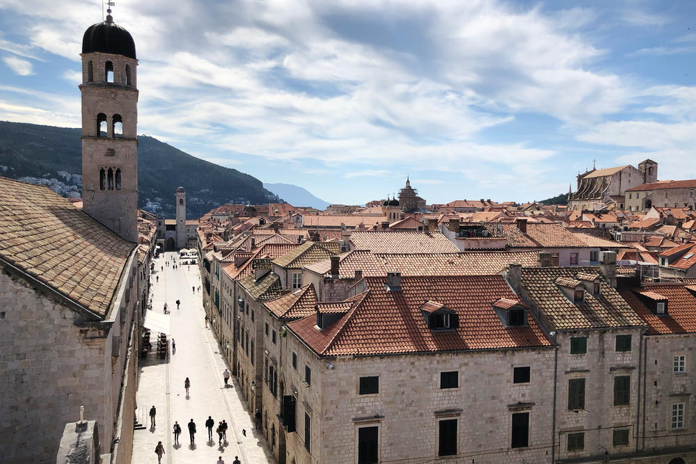 A view of Dubrovnik's old town from atop the ancient city wall. Few people are in the ancient town that's usually packed with tourists in the spring.