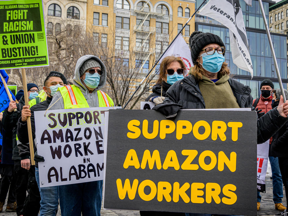 Members of the Workers Assembly Against Racism gather across from an Amazon-owned Whole Foods in New York City as part of a nationwide solidarity event with Amazon workers seeking to unionize in Bessemer, Ala., on Feb. 20.