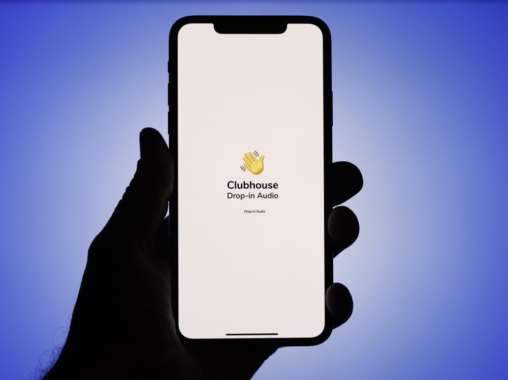 The Clubhouse logo is seen on an iPhone screen in this photo illustration. A Clubhouse room has become a place where Palestinians and Israelis speak openly about the conflict in Gaza.