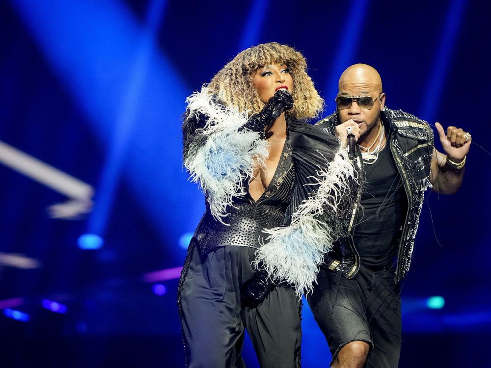 San Marino's Senhit (L) and US rapper Flo Rida perform during the Eurovision Song Contest dress rehearsal in Rotterdam, Netherlands.