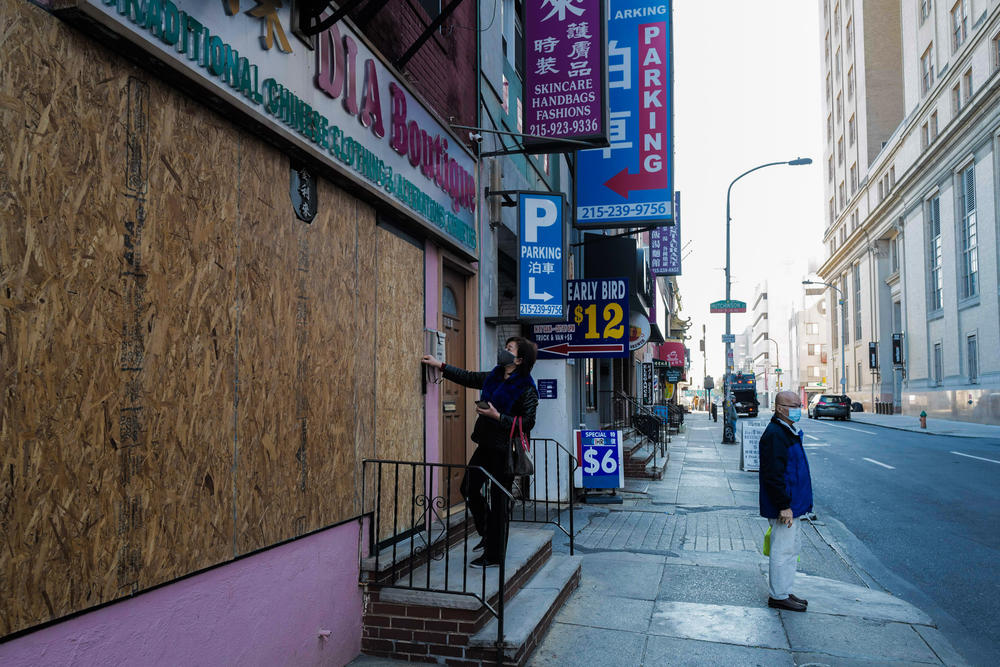 As protests broke out across the nation in 2020, many smaller businesses were looted and robbed. Here, Lai boarded up her shop, Dia Boutique.