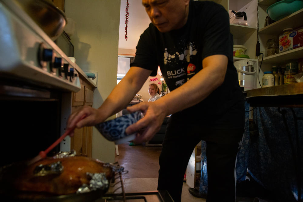 After work, Liang usually spends time making food with her husband for the family.
