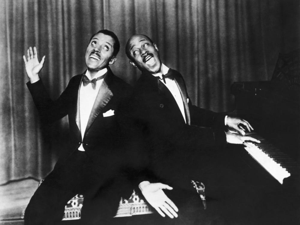 American composer Noble Sissle, left, and pianist Eubie Blake , right, at the piano in 1927.
