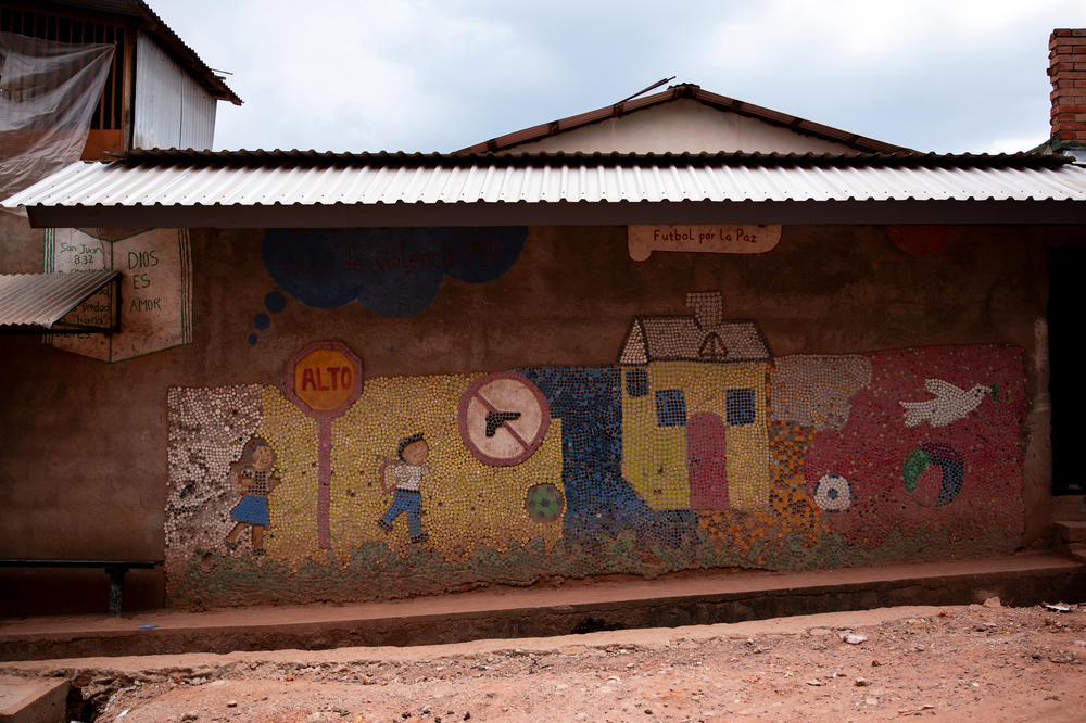 An anti-violence mural on the wall of a street in Tegucigalpa, the capital city of Honduras. The Biden administration has pledged $4 billion to attack the root causes of out-migration from Central America.