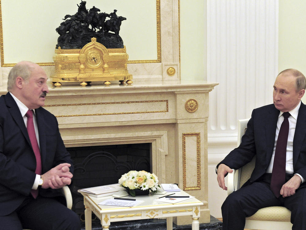 Russian President Vladimir Putin and Belarusian President Alexander Lukashenko talk during their meeting in Moscow on April 22.