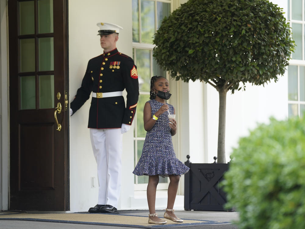 Gianna Floyd, George Floyd's daughter, walks out of the West Wing door at the White House after meeting Tuesday with President Biden and Vice President Harris.