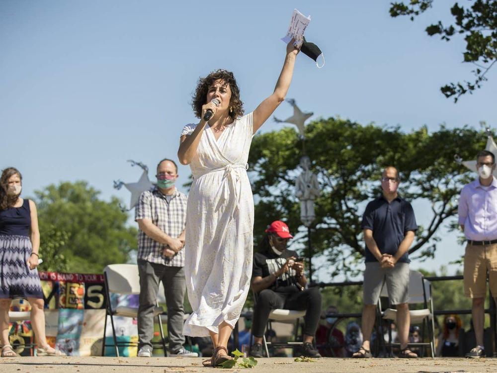 Minneapolis City Council Member Alondra Cano speaks to a crowd that gathered at Powderhorn Park last June. During the event, Cano and eight other Minneapolis City Council members declared their commitment to defunding and dismantling the Minneapolis Police Department. But their support has changed since then.