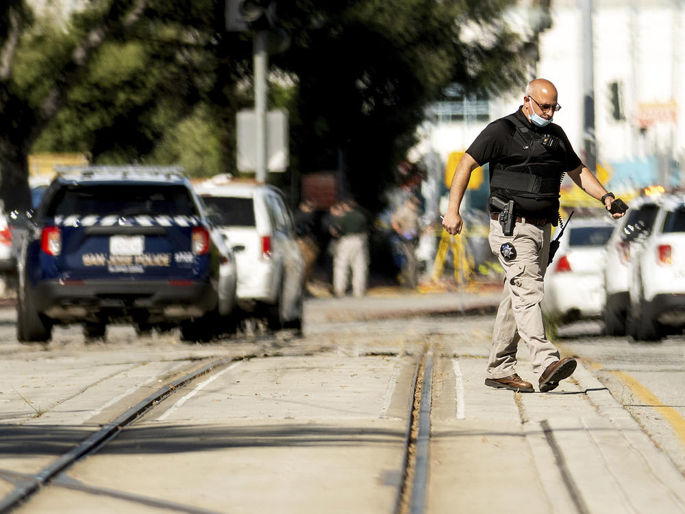 Law enforcement officers respond to a mass shooting at a Santa Clara Valley Transportation Authority facility on Wednesday in San Jose, Calif. A Santa Clara County sheriff's spokesman said the rail yard shooting left multiple people, including the shooter, dead.