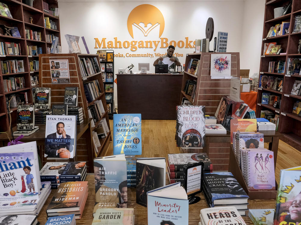 Derrick Young, co-owner of Mahogany Books in Washington, D.C., says his store has seen new customers in the last year who seem to be 