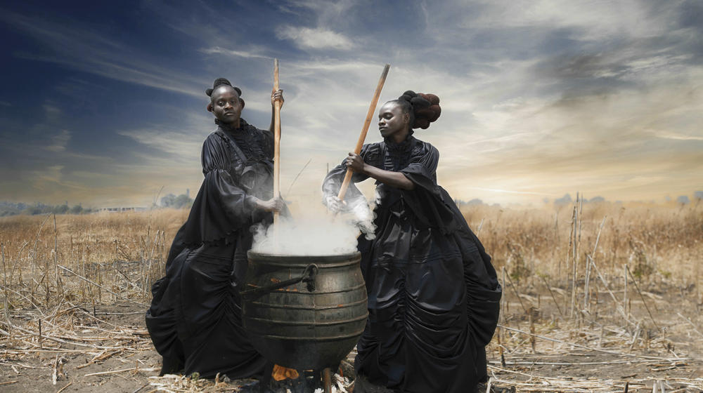 In<em> That Evening Sun Goes Down, </em>two women stir a large cooking pot — an African vessel still used to prepare food for large gatherings.