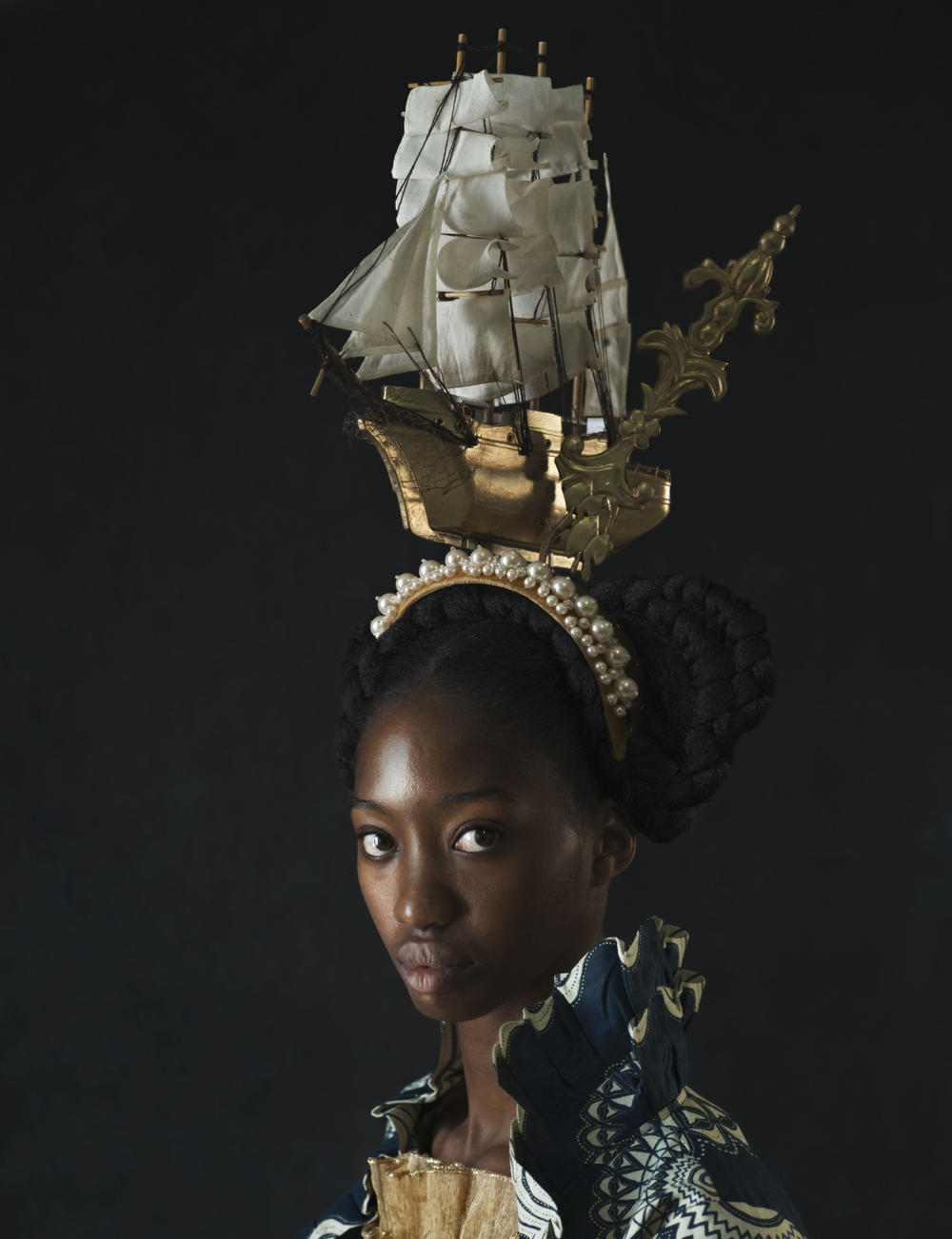 <em>Vessel. </em>This headdress was inspired by the children's book 