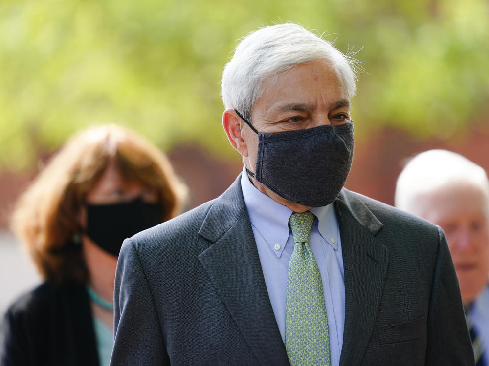Former Penn State President Graham Spanier walks from the Dauphin County Courthouse in Harrisburg, Pa., after a hearing on Wednesday. A judge said Spanier must report to jail on July 9 to begin serving at least two months for endangering the welfare of children.
