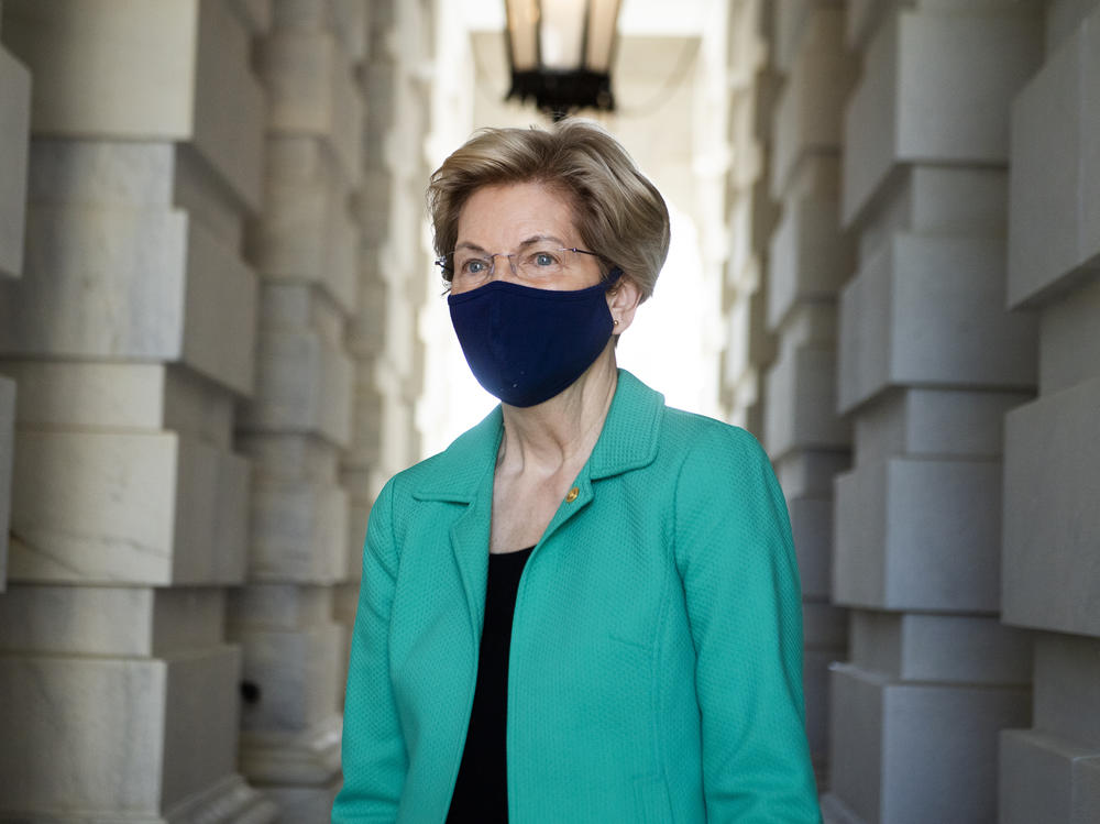 Sen. Elizabeth Warren heading to a news conference in Washington, D.C., on April 27. Warren, a member of the Senate Banking Committee, tells NPR that a key part of her job as a lawmaker will be oversight.