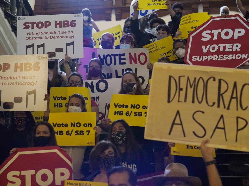 In this May 6, 2021 file photo, a group opposing new voter legislation gather outside the House Chamber at the Texas Capitol in Austin. Texas Republicans dug in Saturday, for a final weekend vote on some of the most restrictive new voting laws in the U.S., finalizing a sweeping bill.