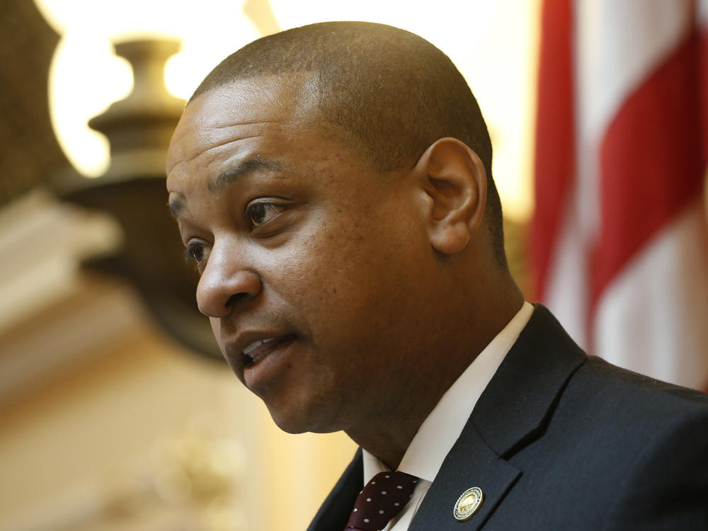 About a year after two women accused him of sexual assault, Virginia Lt. Gov. Justin Fairfax makes comments during a debate on a bill during the state Senate session at the state Capitol in Richmond in March 2020. Fairfax denies the allegations against him.