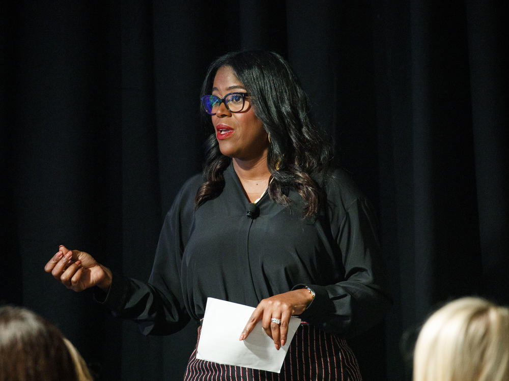 Thasunda Duckett, then an executive at JPMorgan Chase & Co., speaks during an investment conference in Dana Point, Calif., on Oct. 2, 2018. Duckett, currently the CEO of TIAA, says the Tulsa riots led to a erosion of trust by Blacks in the financial system.