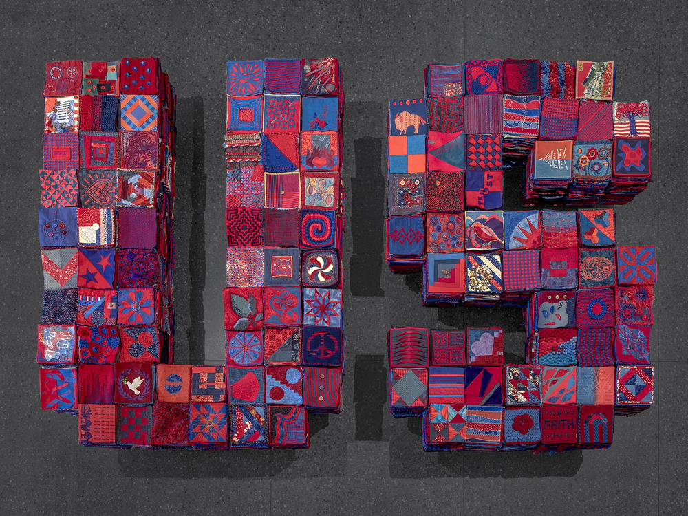 In January 2020, Arizona artist Ann Morton put out a call on social media asking people to create 8 inch by 8 inch textile squares that use equal parts red and blue. The squares and the project as a whole stands for a set of values: respect for the other, citizenship, compromise, country over party and corporate influence, and creativity.