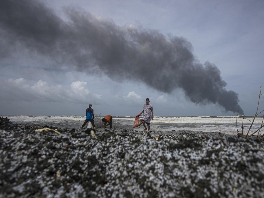 Sri Lankans salvage wreckage washed from the burning Singaporean ship X-Press Pearl last week.