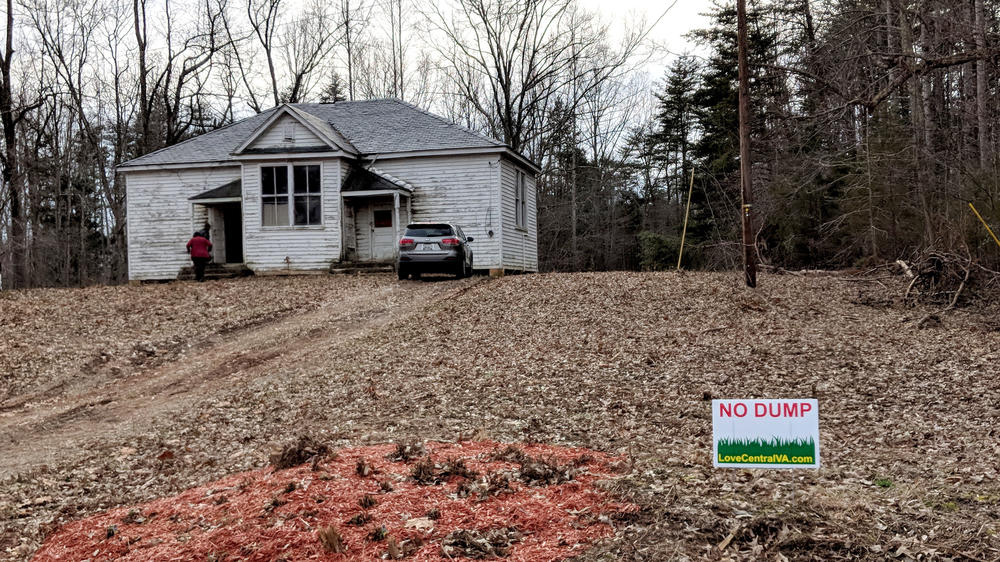 The Pine Grove schoolhouse is threatened by the expansion of a nearby landfill.