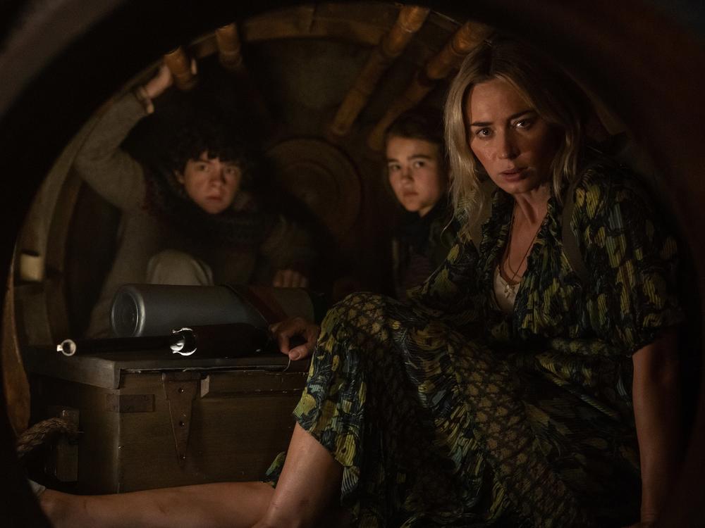 Marcus (Noah Jupe), Regan (Millicent Simmonds) and Evelyn (Emily Blunt) brave the unknown in <em>A Quiet Place Part II.</em>