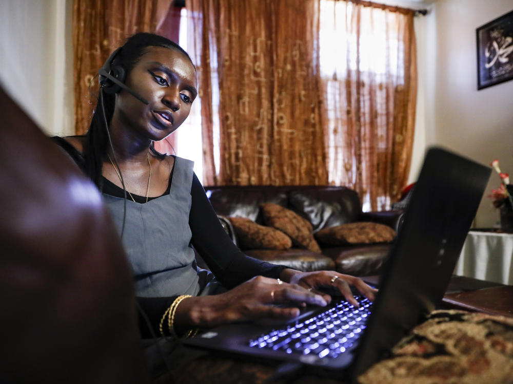 Maryama Diaw, a contact tracer in New York City, worked remotely from her home last year. Coronavirus contact tracing programs across the U.S. are starting to scale back, according to NPR's latest survey.