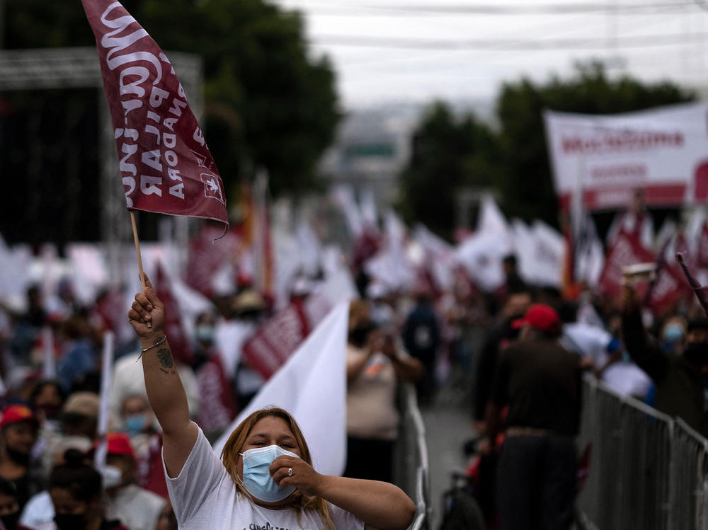 Supporters of the Morena party's candidate for governor of Baja California, Marina del Pilar Ávila, attend the closing campaign rally in Tijuana, Baja California, Mexico, on Wednesday.