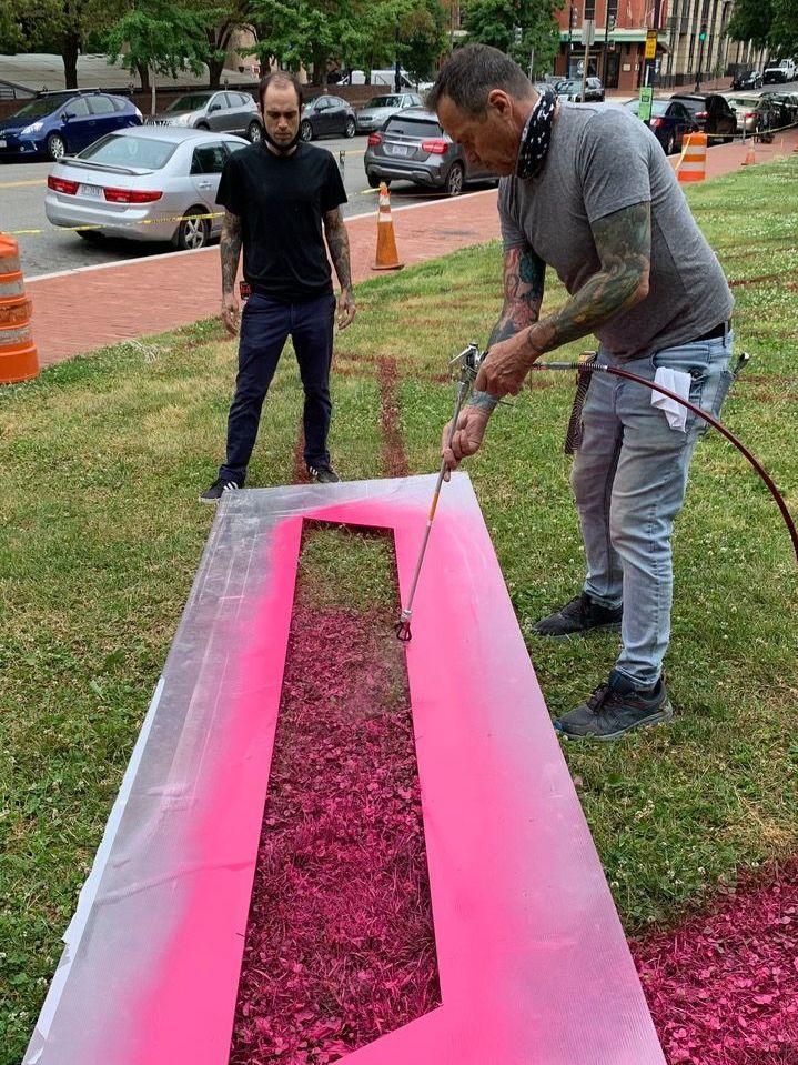 A crew from the museum helped spray paint onto the lawn according to Thalhammer's design.