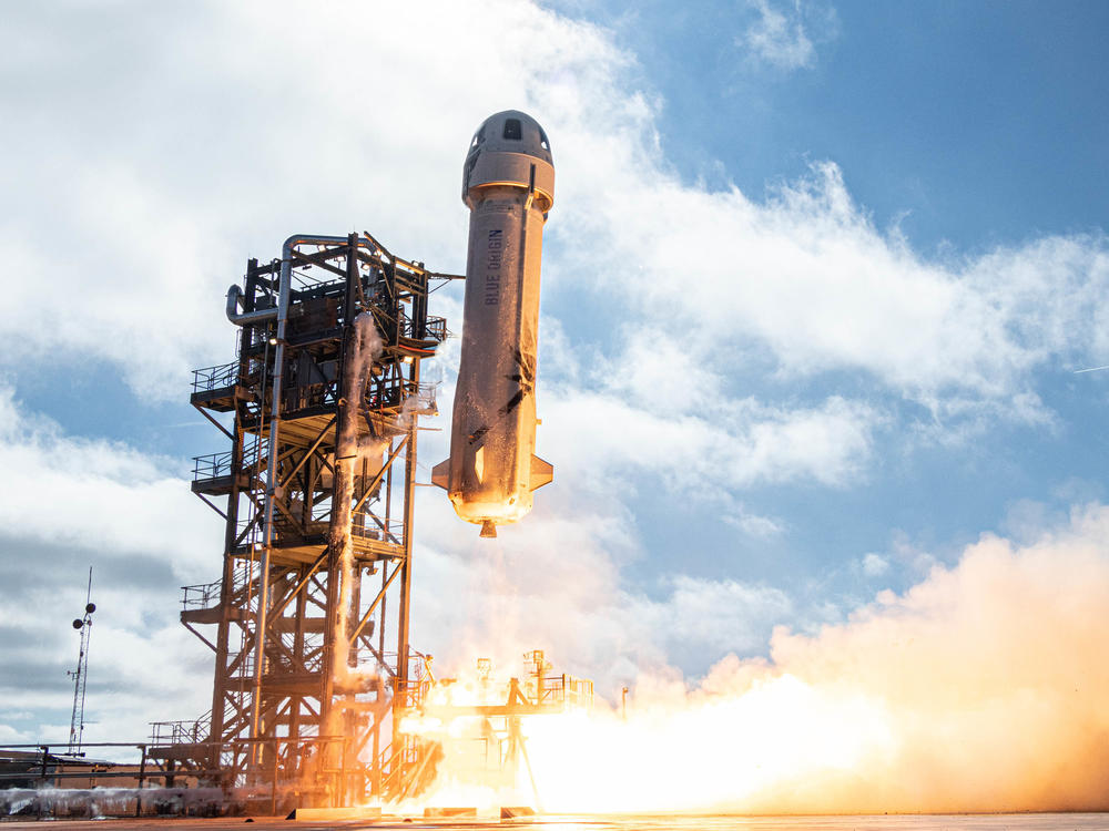 Blue Origin's New Shepard rocket is seen here launching with a capsule attached in 2019.