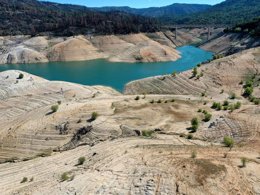 Warmer temperatures are leading to emptier reservoirs across the West, such as Lake Oroville in Northern California.