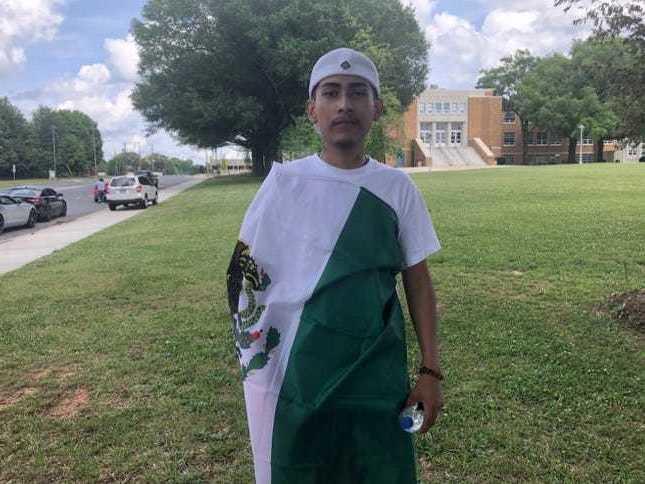 Ever Lopez, 18, wore the Mexican flag over his graduation robe at his high school graduation ceremony. The school withheld his diploma, claiming he violated the dress code.