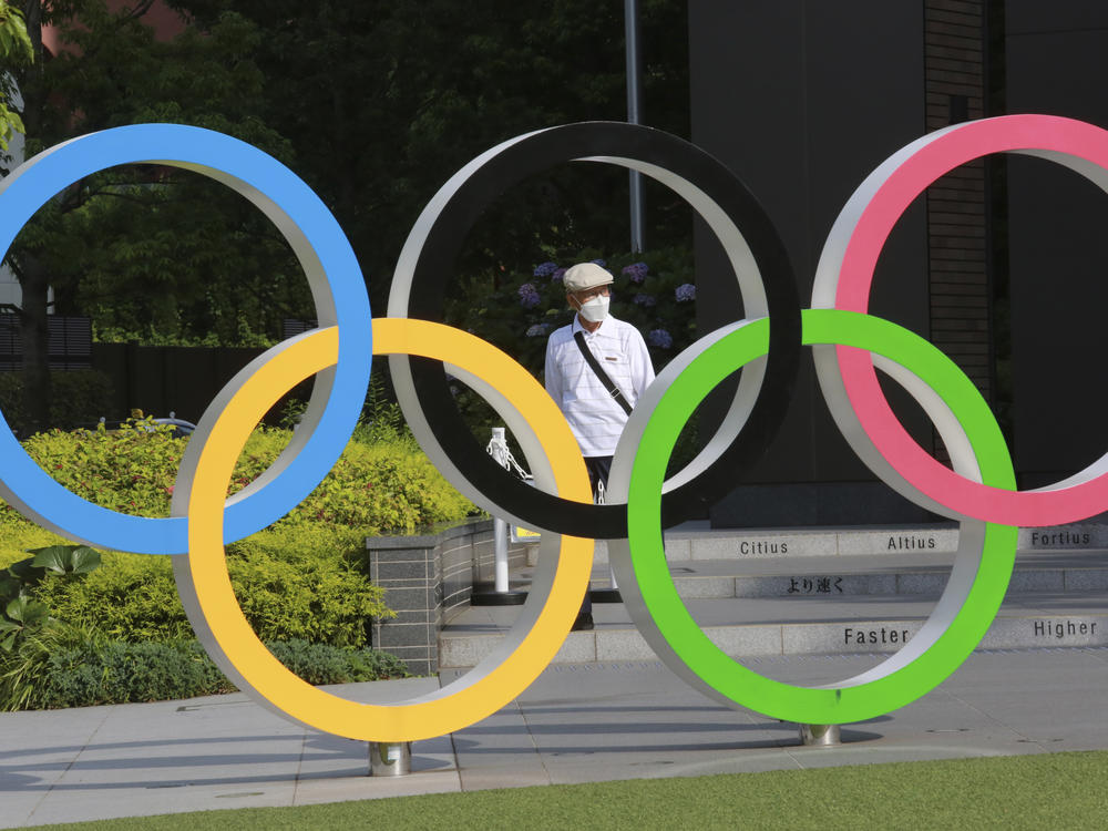 The International Olympic Committee plans to implement strict virus-prevention measures that include segregation of athletes from the general population and a ban on overseas fans.