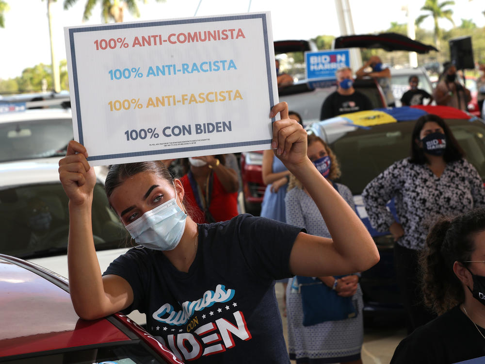 A Joe Biden supporter attends a drive-in voter mobilization event in Miramar, Fla., on Oct. 13, 2020. Democrats lost Florida because they failed to engage and target their message to the Latino community, says Quentin James, president of The Collective PAC.