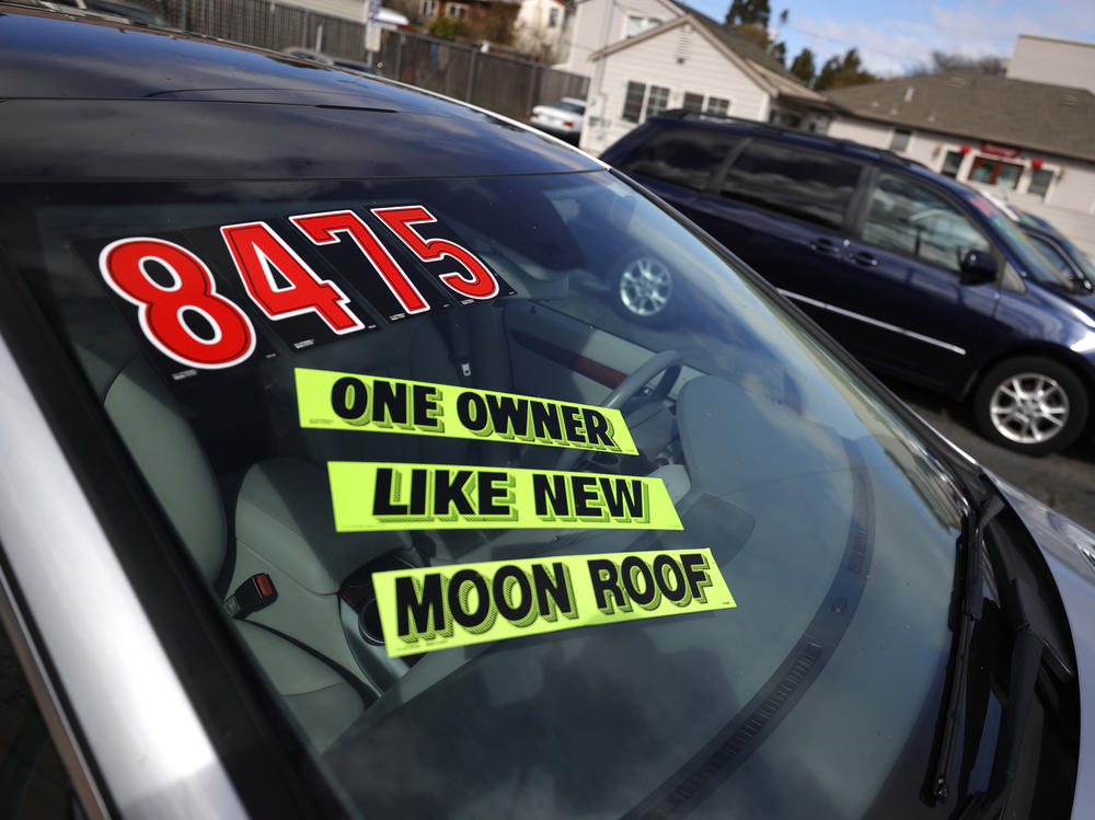 Used cars sit on the sales lot at Frank Bent's Wholesale Motors in El Cerrito, Calif., on March 15. Supply chain snarls and pent-up demand are driving up the prices of a lot of things, including new and used cars.