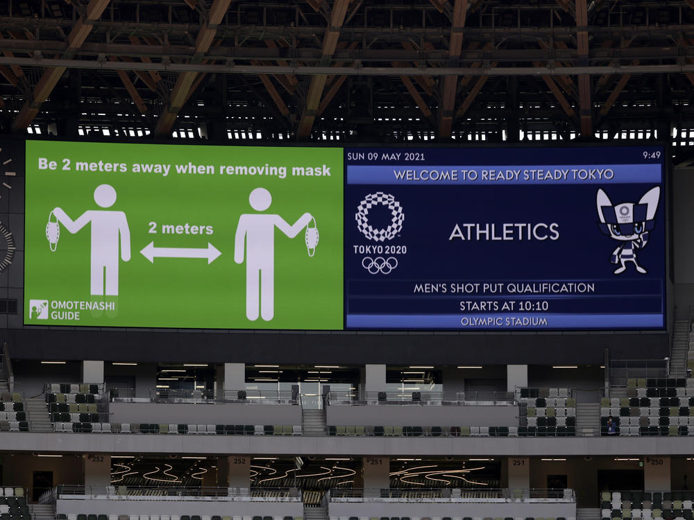 Signs on a screen are shown before an athletics test event for the Tokyo 2020 Olympic Games last month at the National Stadium in Tokyo.