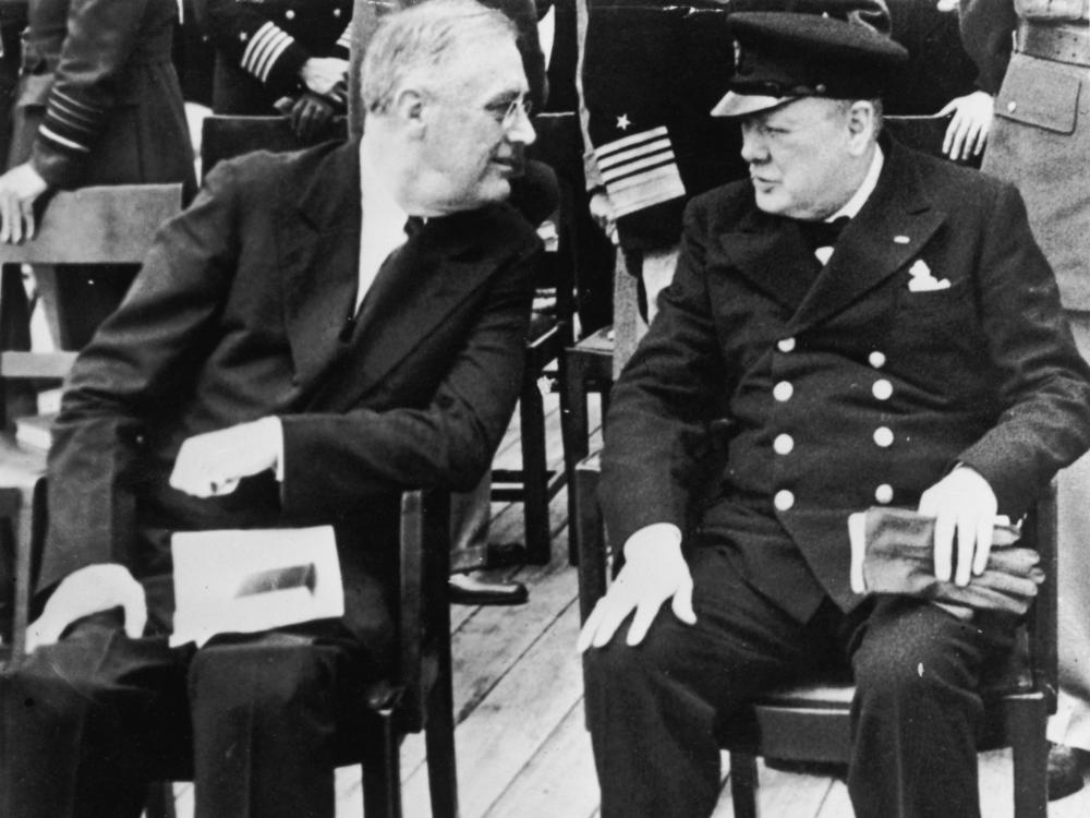 President Franklin D. Roosevelt and British Prime Minister Winston Churchill aboard a ship off Newfoundland in 1941, where they signed the original Atlantic Charter.