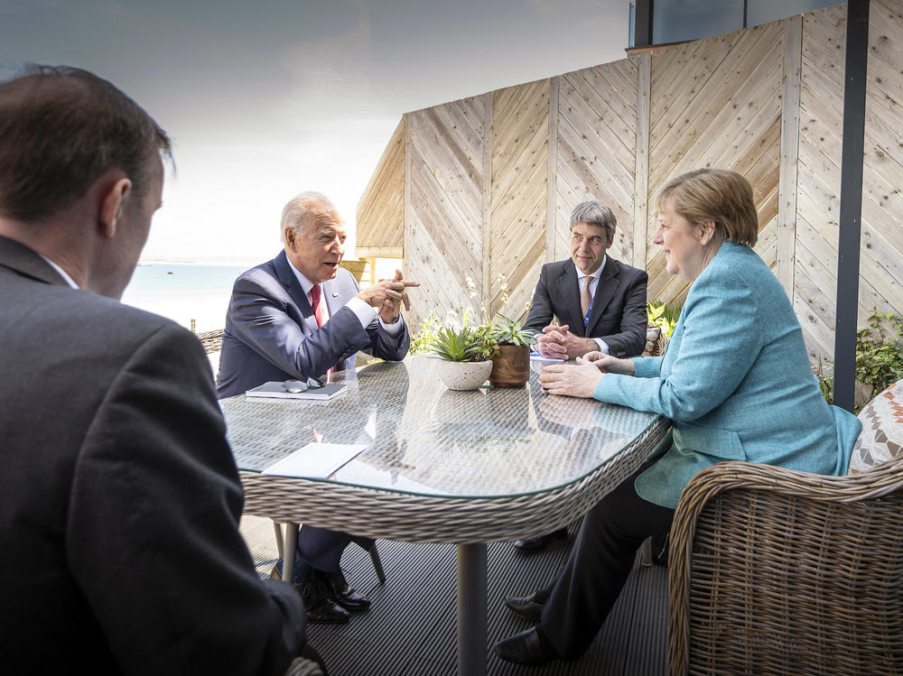 President Biden meets with German Chancellor Angela Merkel on the sidelines of the G-7 summit. A White House official said Biden did a lot of 